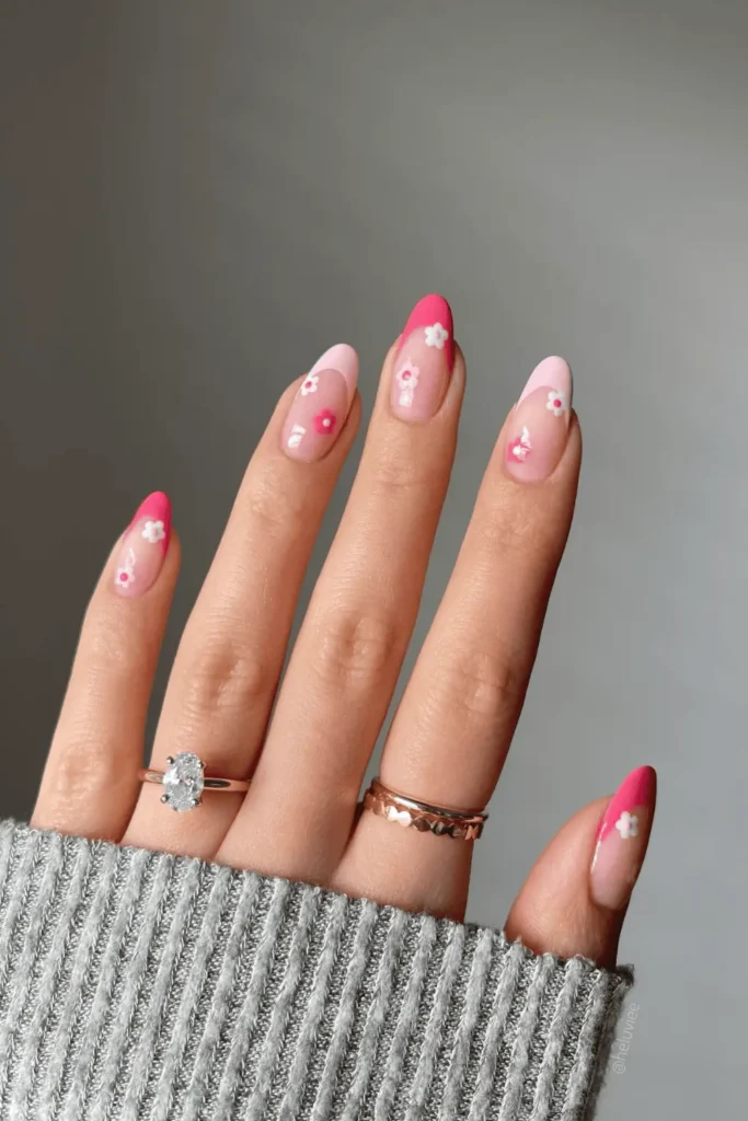 Blooming Pink Promise nail design featuring soft pink hues, delicate floral patterns, and a romantic spring-inspired aesthetic.