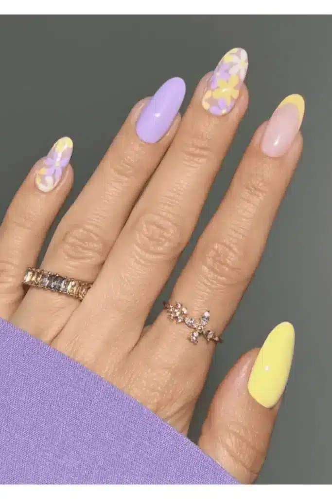 Butterfly Garden Party nail design featuring delicate butterfly accents, pastel florals, and a whimsical spring-inspired look.