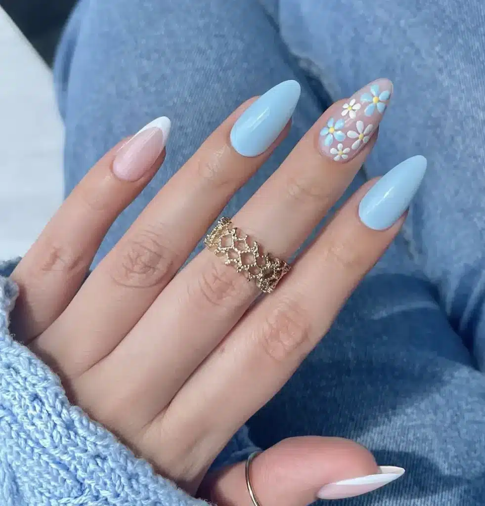 Daisy Fresh Blue nail design featuring soft blue hues, delicate white daisies, and a fresh, spring-inspired aesthetic.