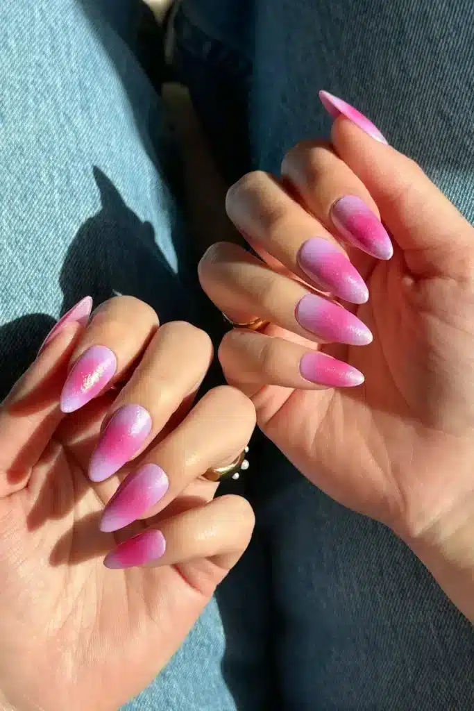 Pink Ombré Sparkle Dreams nail design featuring a soft pink gradient with shimmering glitter for a glamorous and dreamy look.