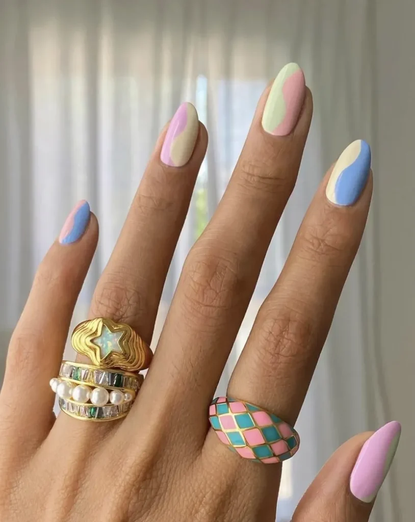 Springtime Whimsy nail design featuring delicate floral patterns and soft pastel colors for a playful, spring-inspired look.