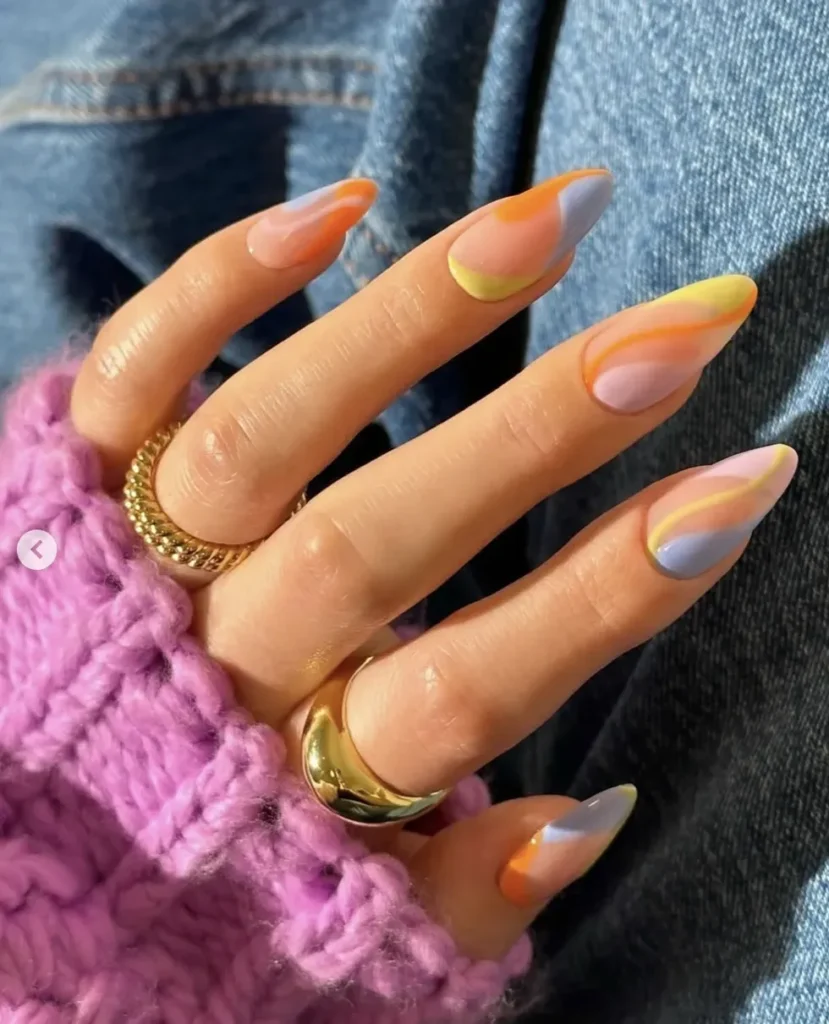Sunset Gradient Dreams nail design featuring a beautiful gradient effect of warm orange, pink, and orange hues for a dreamy, sunset-inspired look.